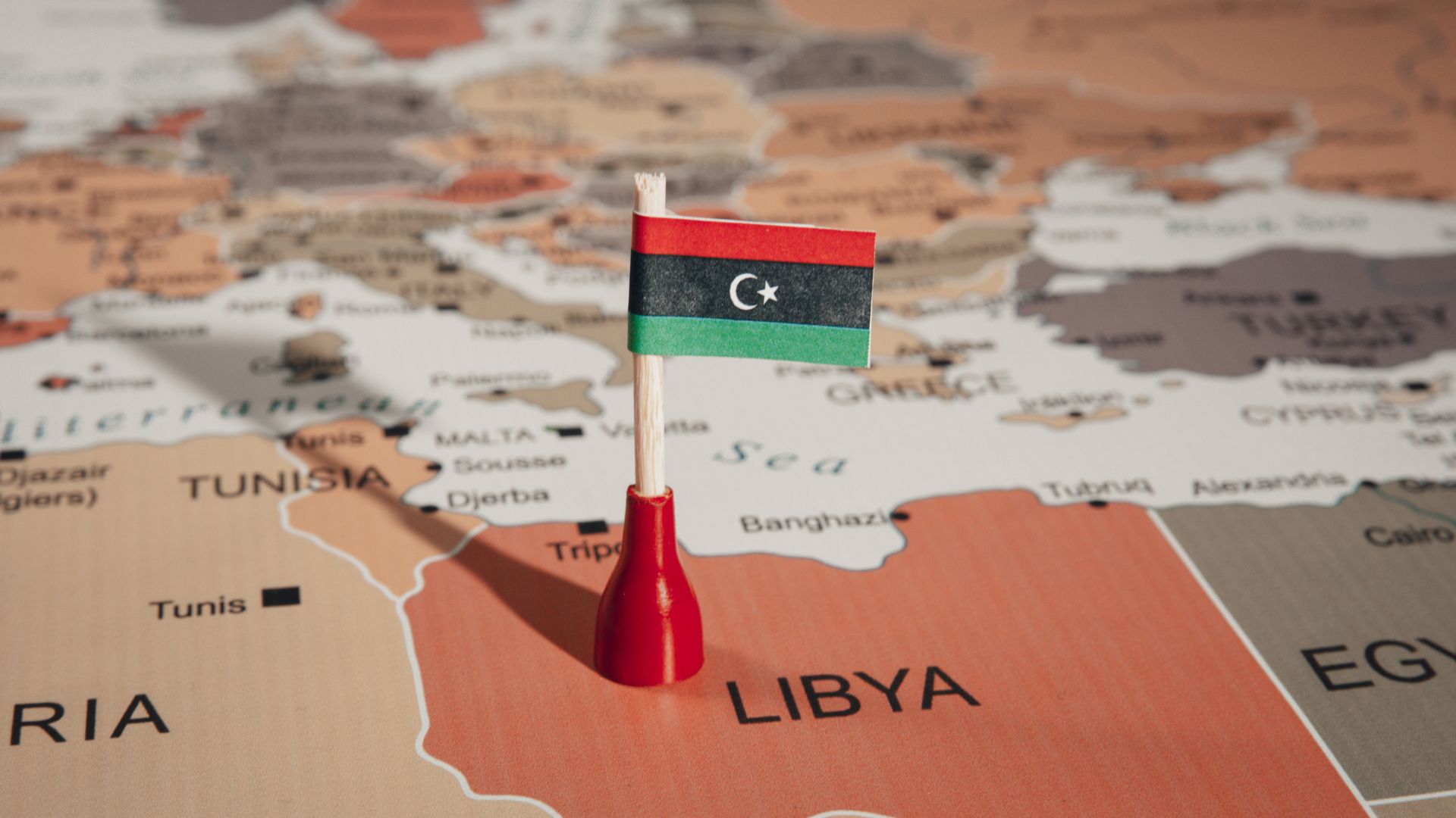 Libya flag on map of Libya